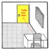 Table face a door